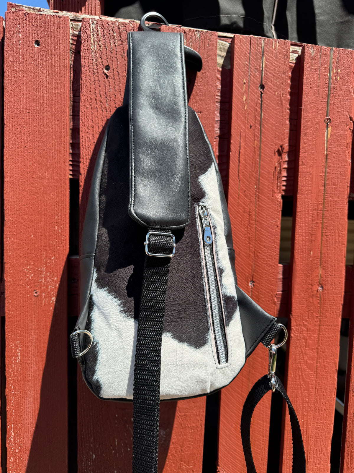Cow print sling bag