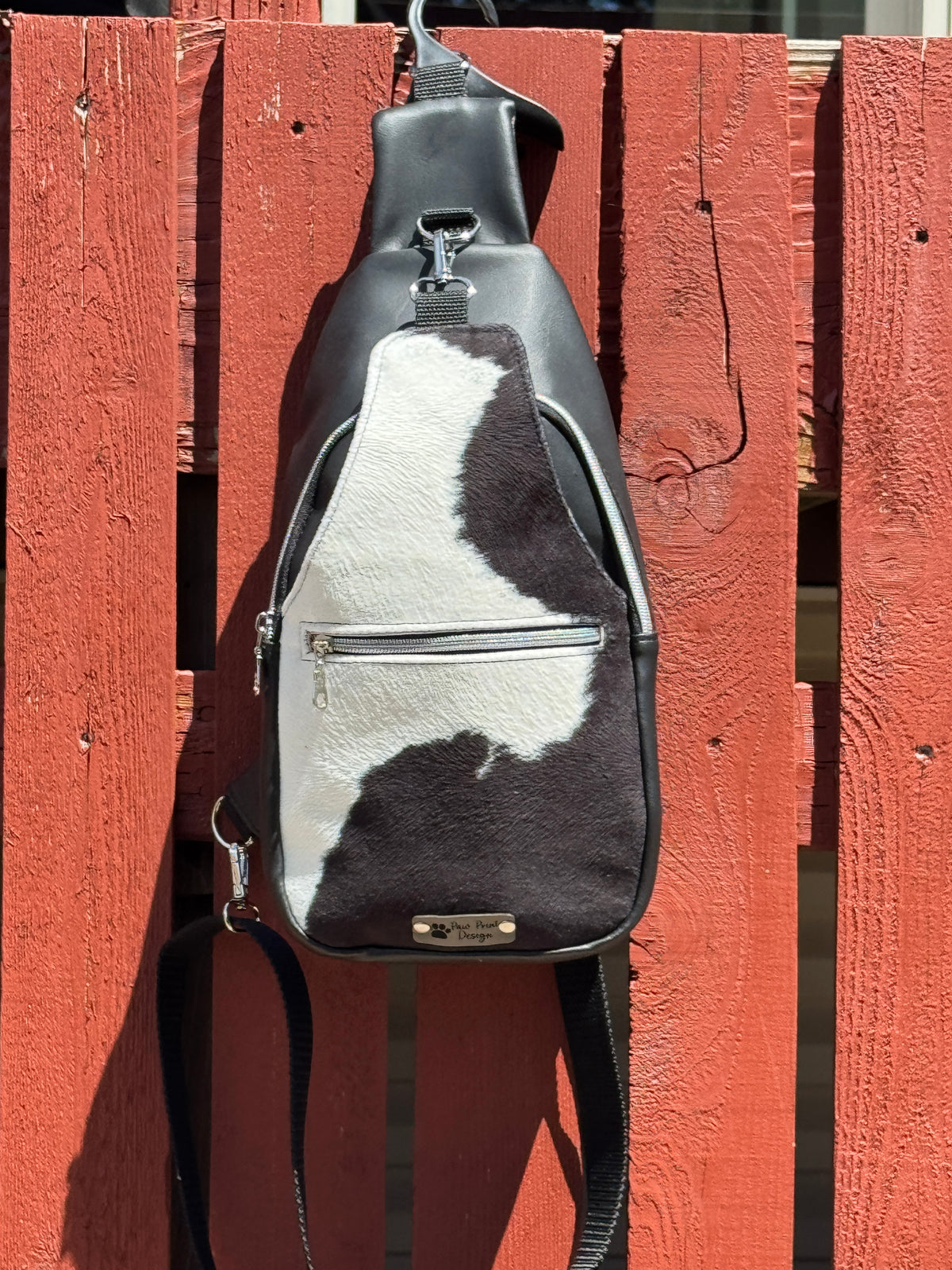 Cow print sling bag