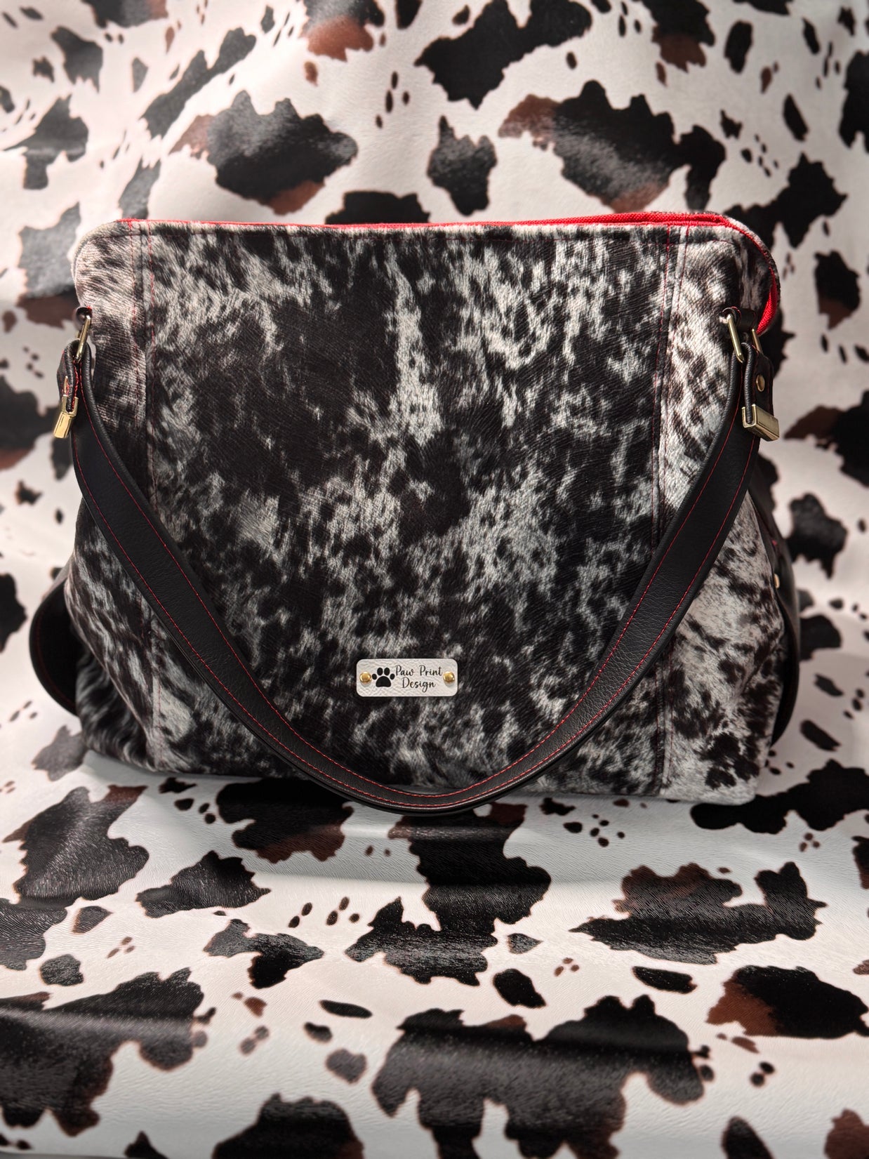 Luz Marina Handbag in Cow Print and Black Faux Leather Accent