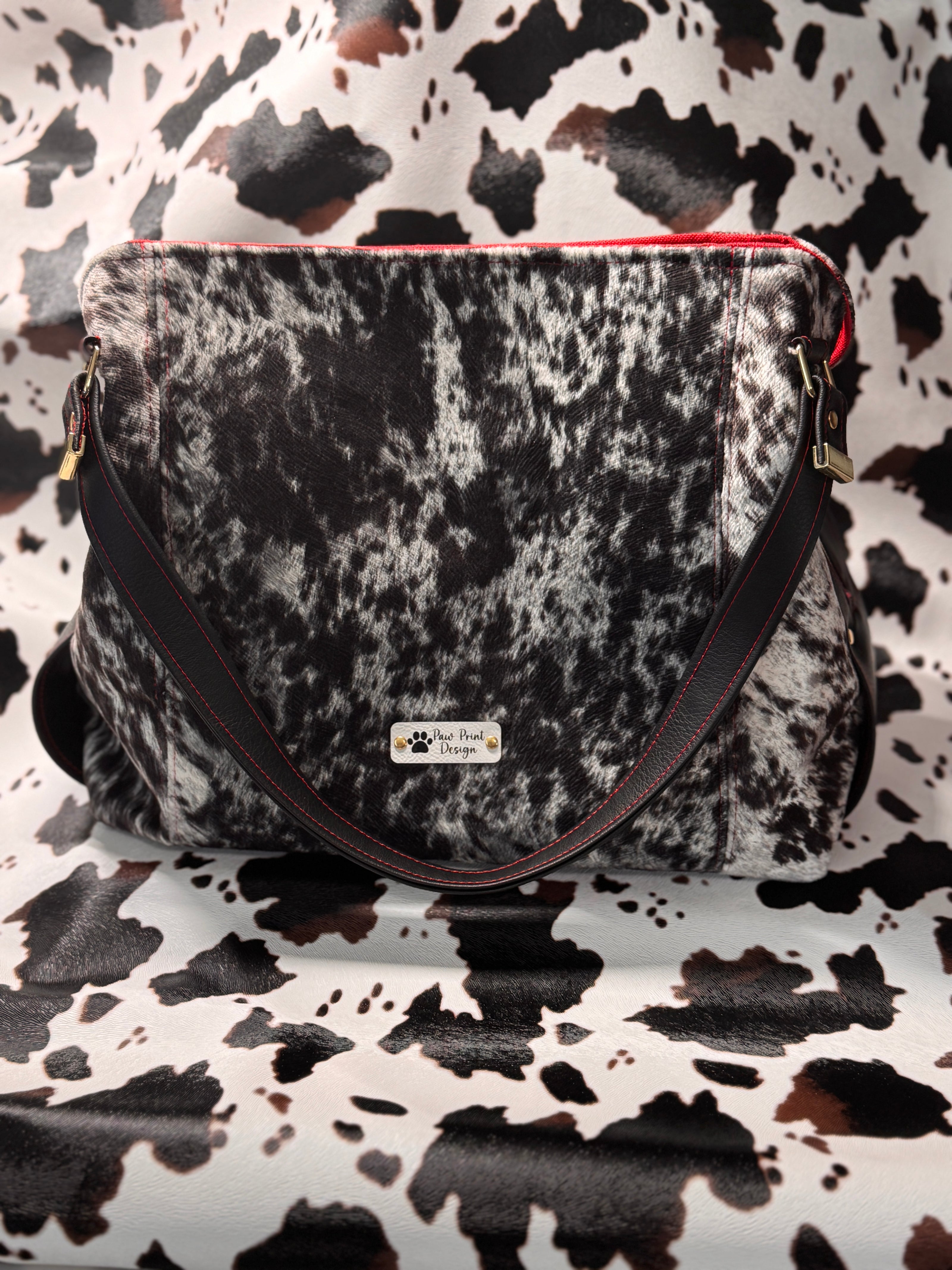 Luz Marina Handbag in Cow Print and Black Faux Leather Accent