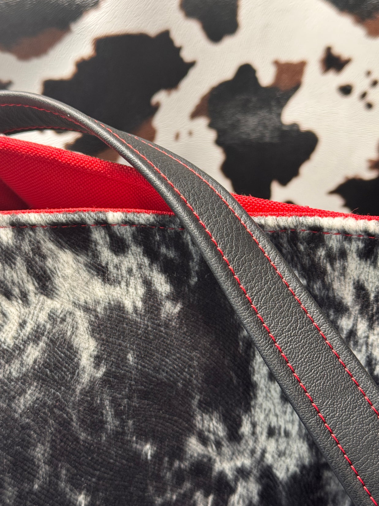 Luz Marina Handbag in Cow Print and Black Faux Leather Accent