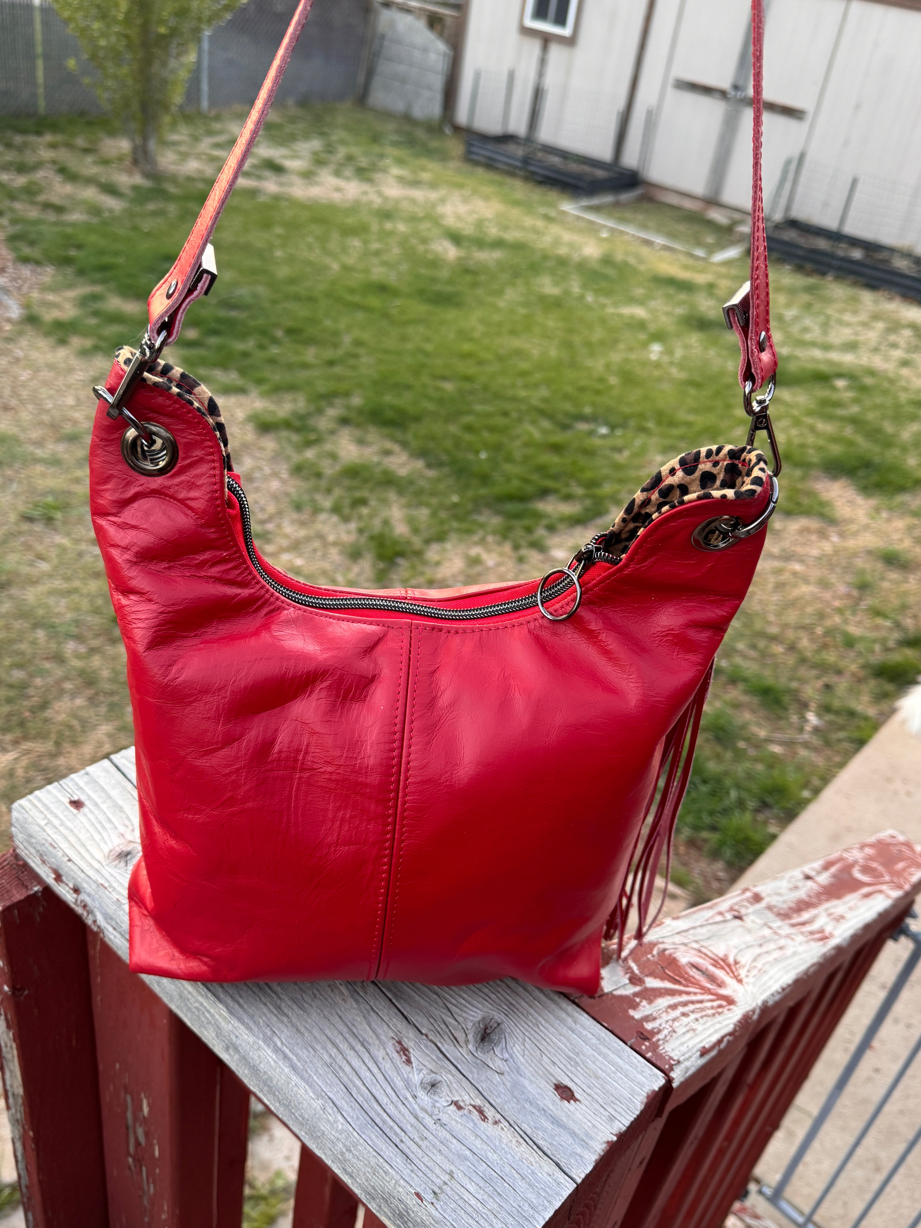 Uptown Swing - Red Leather Slouchy Shoulder Bag with Leopard Print Lining